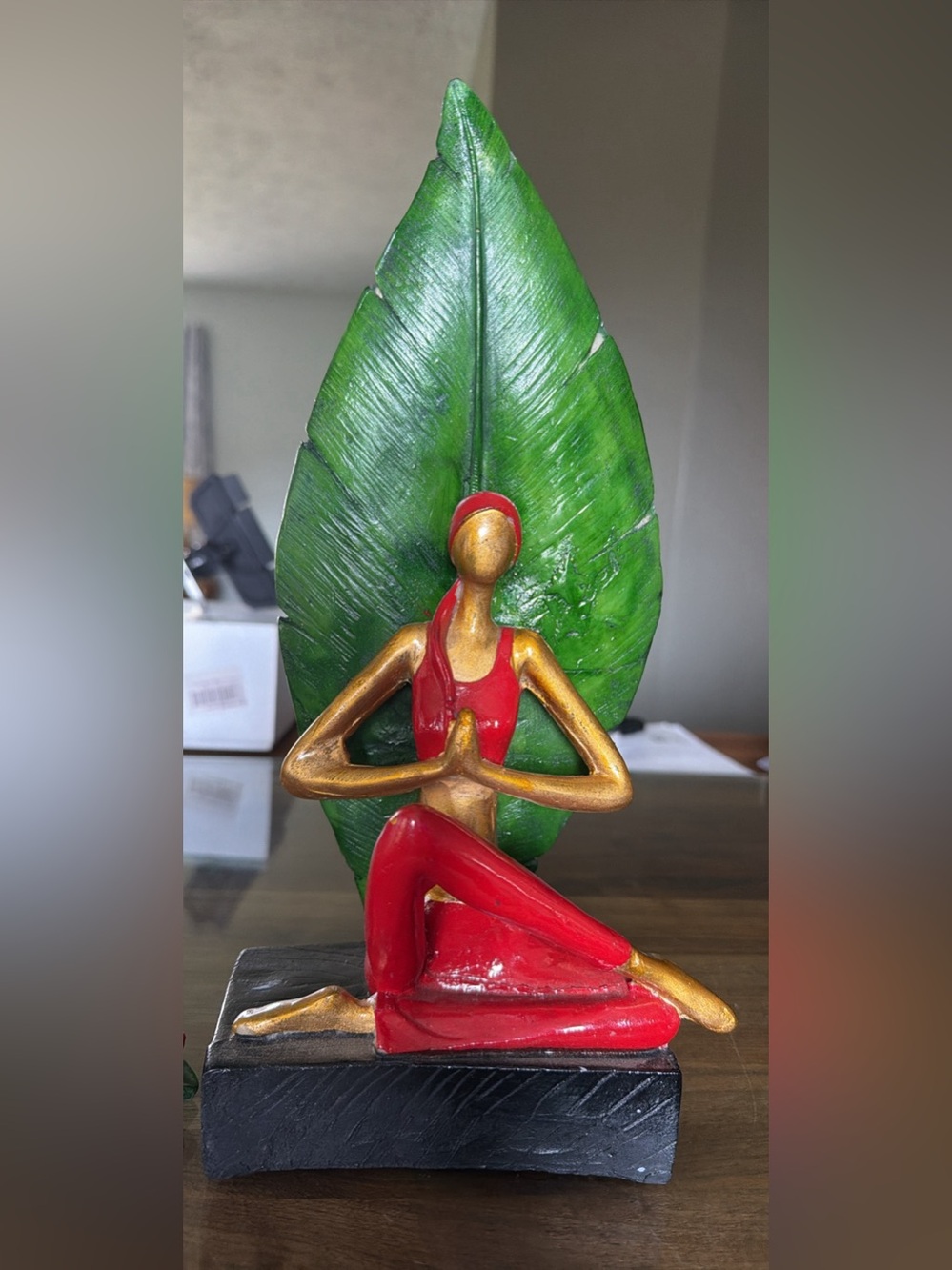 Decorative Red & Gold Yoga Figurine with Green Leaf Backing